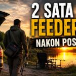 Ribolovac dolazi na večernju feeder sesiju nakon posla uz jezero tijekom zalaska sunca s feeder štapovima i opremom za ribolov